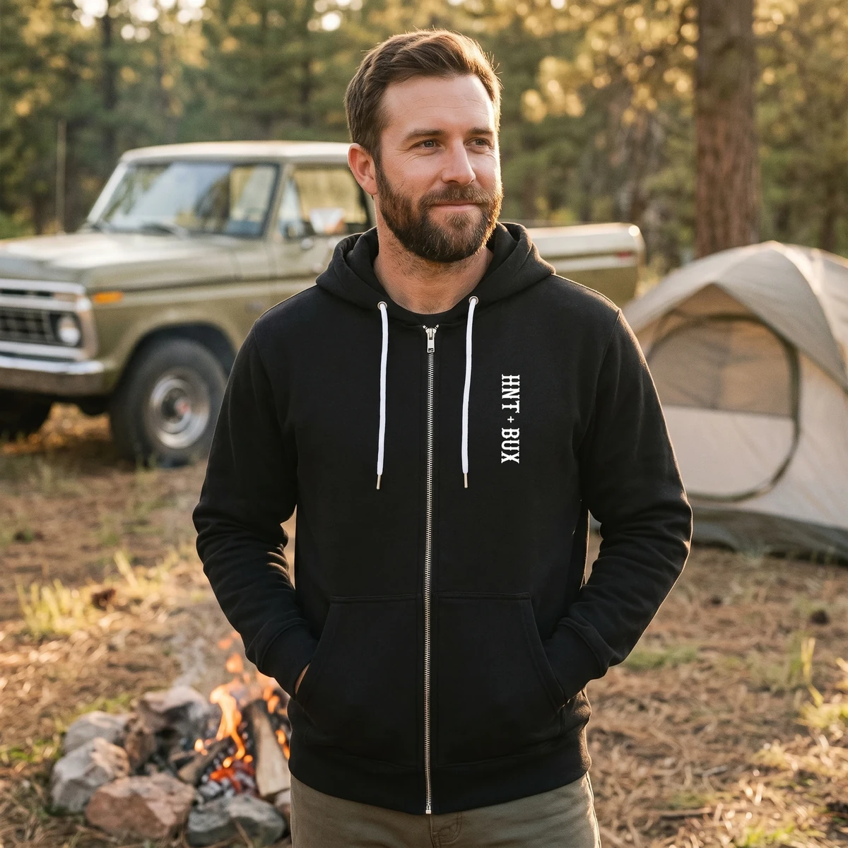 Hunter wearing the HNT BUX hoodie at deer camp