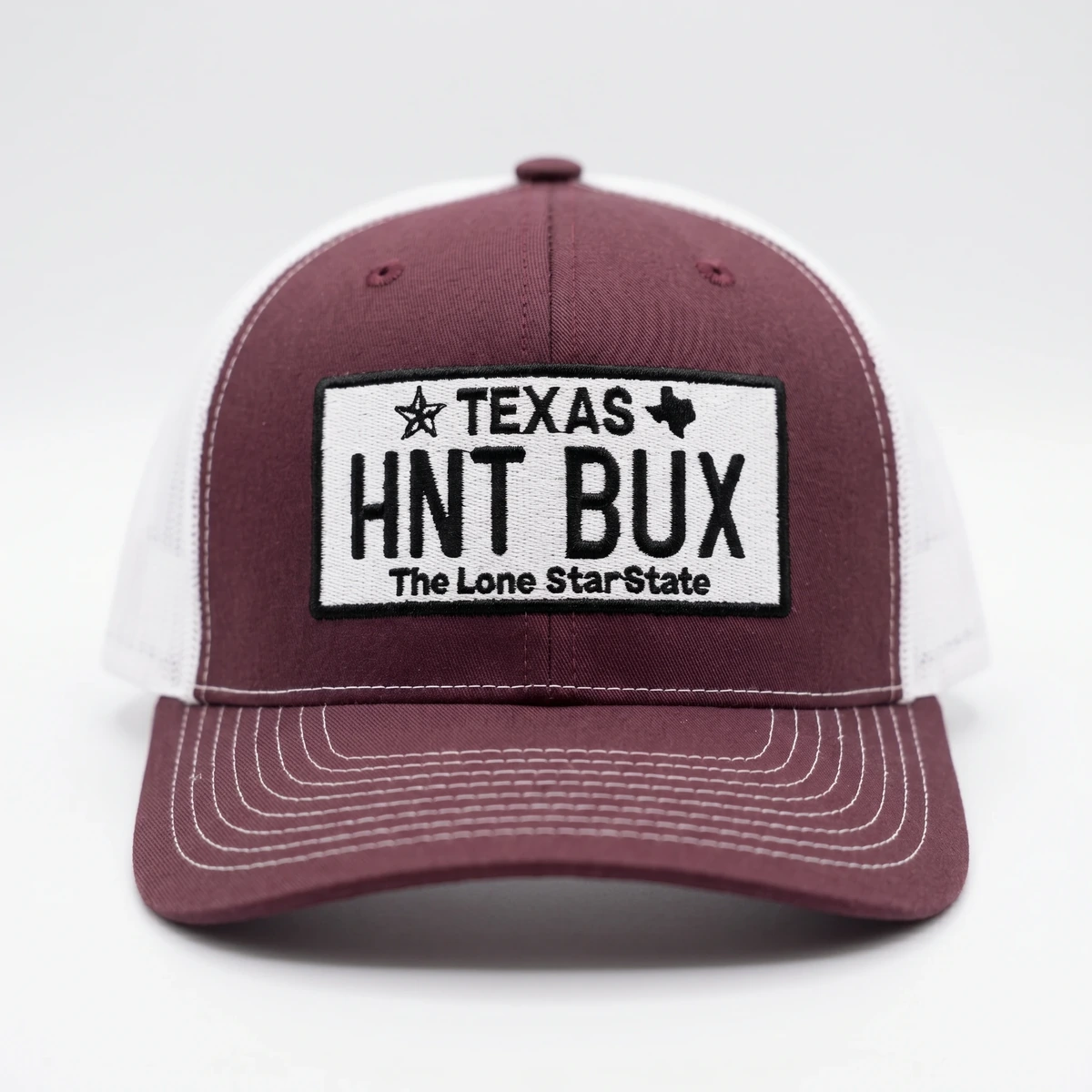 Burgundy and white Texas HNT BUX trucker cap with front patch